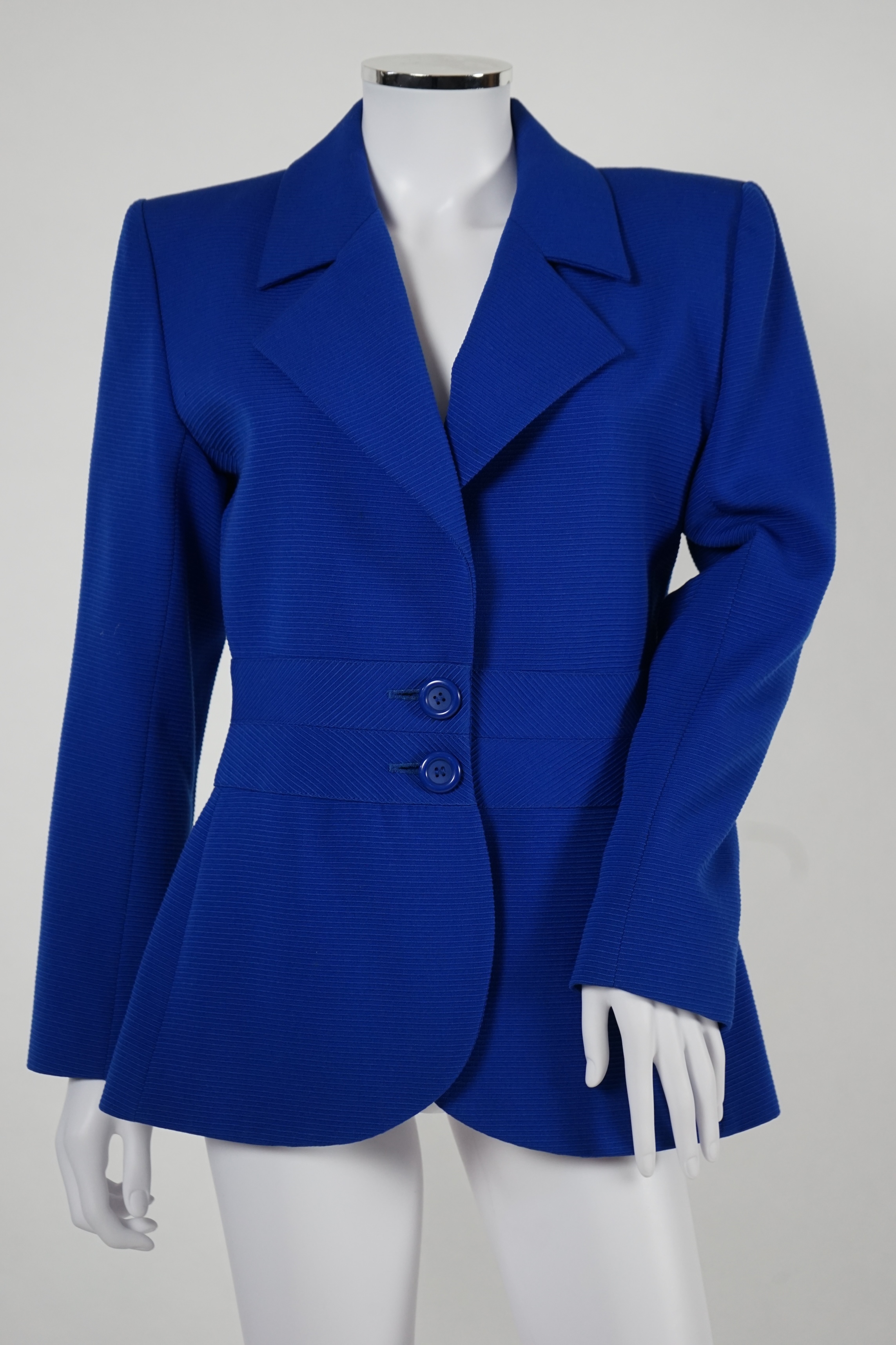 Two vintage Yves Saint Laurent variation lady's wool skirt suits, royal blue and pink. F 40 (UK 12). Please note alterations to make the waist smaller may have been carried out on some of the skirts. Proceeds to Happy Pa